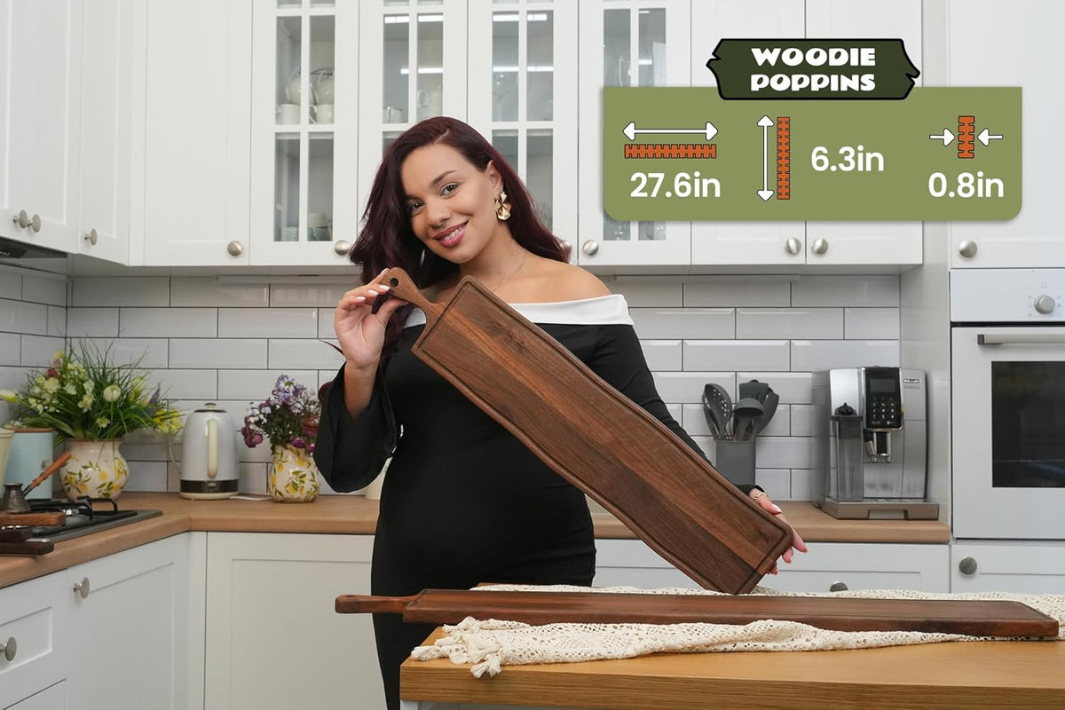 Elegant Walnut Wood Long Serving Board with Handle - Charcuterie Wooden Board - Stylish Versatility for Culinary Delights - Reversible with Juice Groove - 27.6x6.3x0.8 in - Woodie Poppins (Medium)