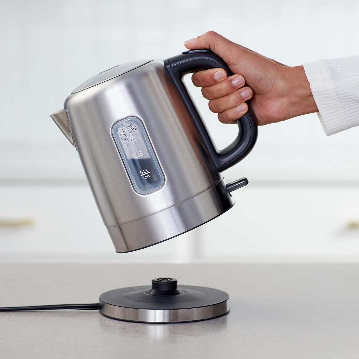 Amazon Basics Electric Stainless Steel Kettle for Tea and Coffee, BPA-Free, Fast Boiling, Auto Shut-Off, 1.1 Quarts, 1500W, Black and Silver